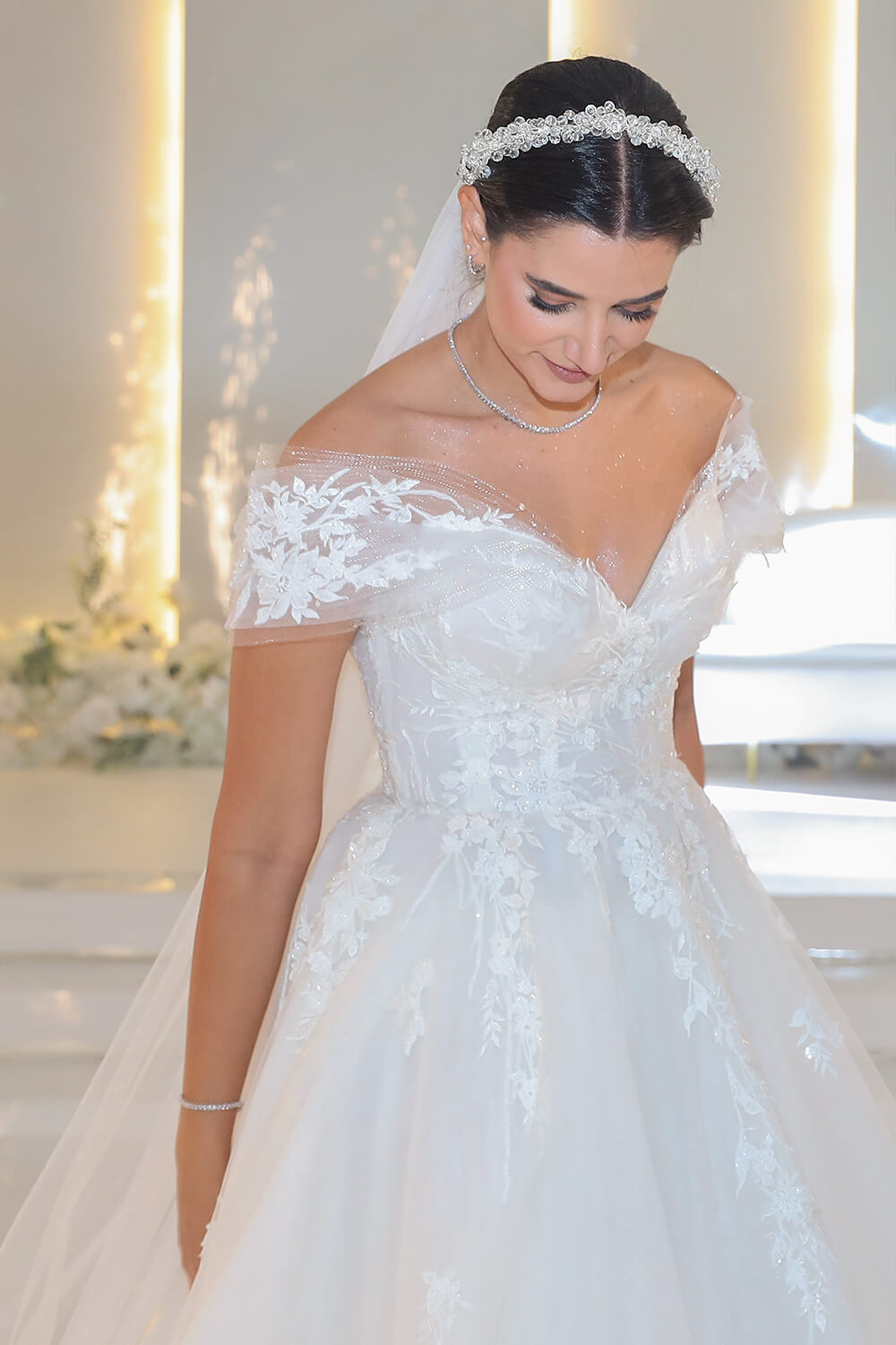 Off-the-shoulders wedding gown